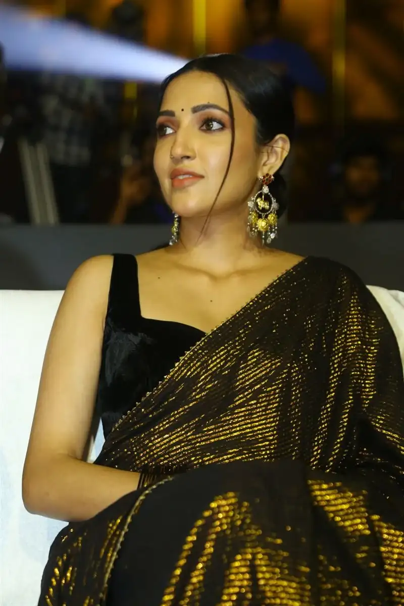 Neha Shetty in Black Saree at Movie Pre Release Event